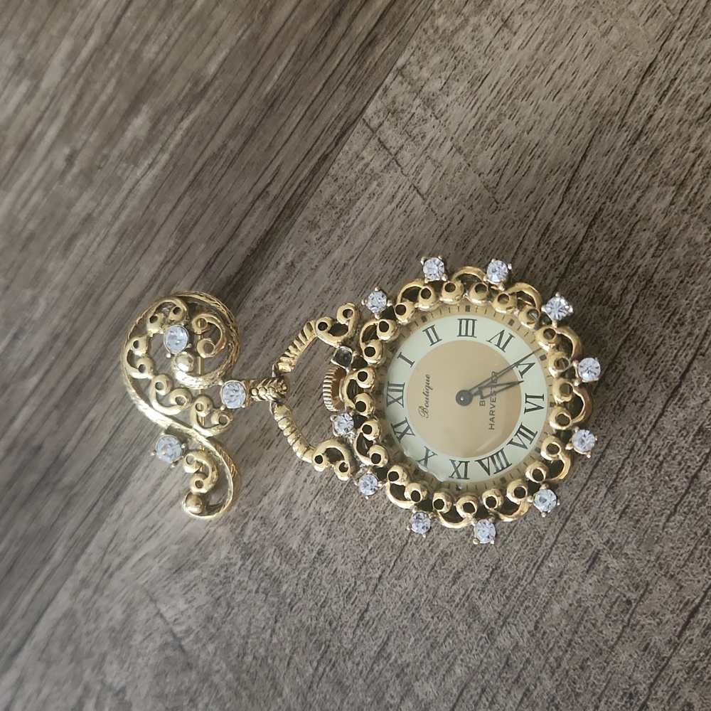 Vintage Harvester gold watch brooch